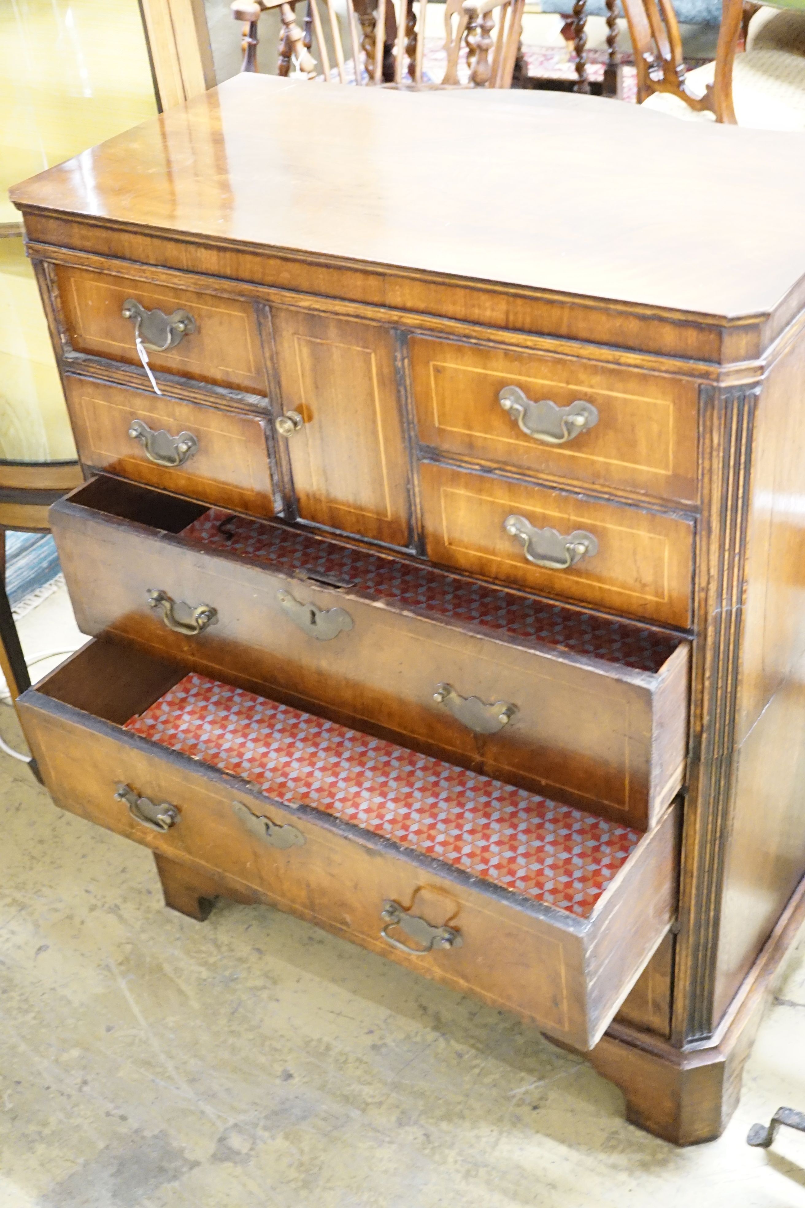 A George II and later walnut, oak and boxwood strung chest of eight drawers, 79 cm wide, 41.5 cm deep, 99 cm high